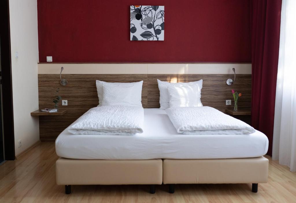 Postel nebo postele na pokoji v ubytování HOTEL MARIA