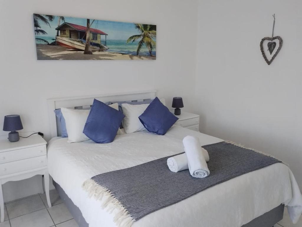 Postel nebo postele na pokoji v ubytování Cosy Beach Vibes