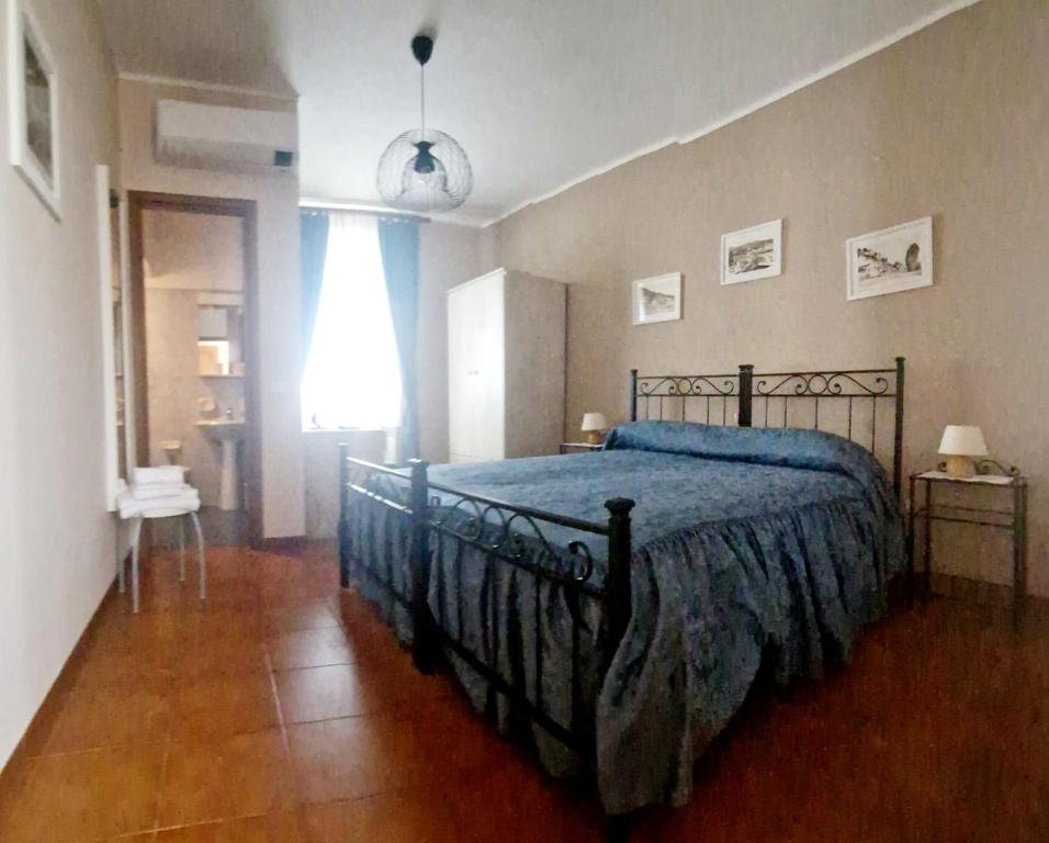 Postel nebo postele na pokoji v ubytování Albergo ristorante Da Tunon