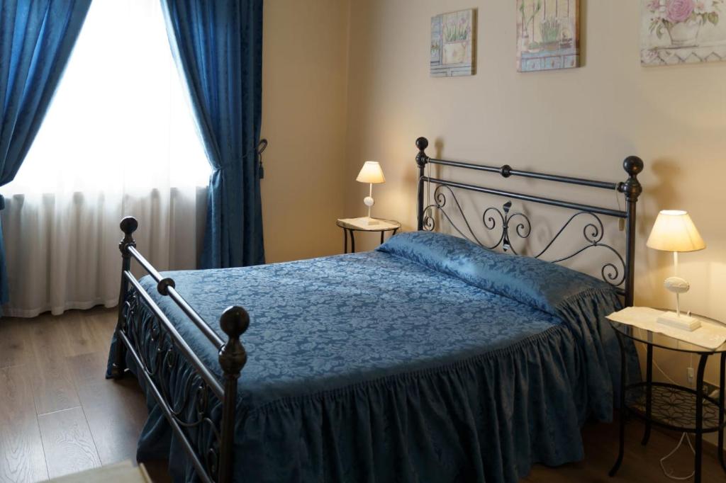 Postel nebo postele na pokoji v ubytování Albergo ristorante Da Tunon