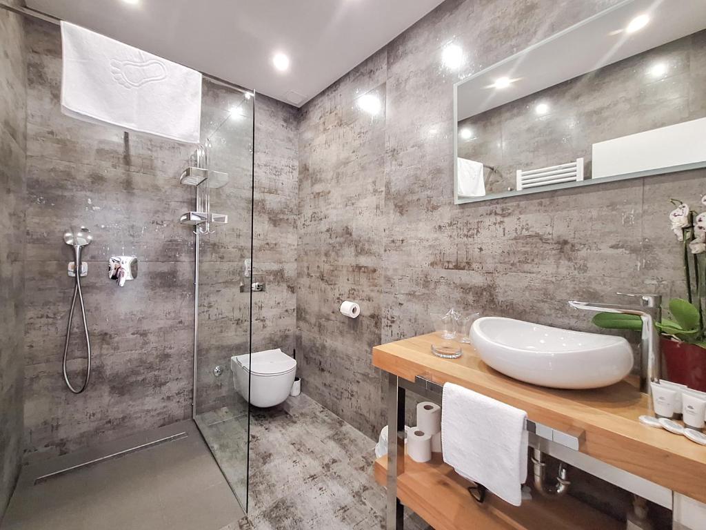 Koupelna v ubytování Kaša Rooms 1