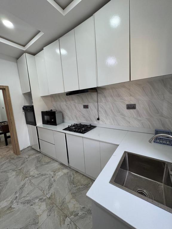 Kuchyň nebo kuchyňský kout v ubytování Candy home