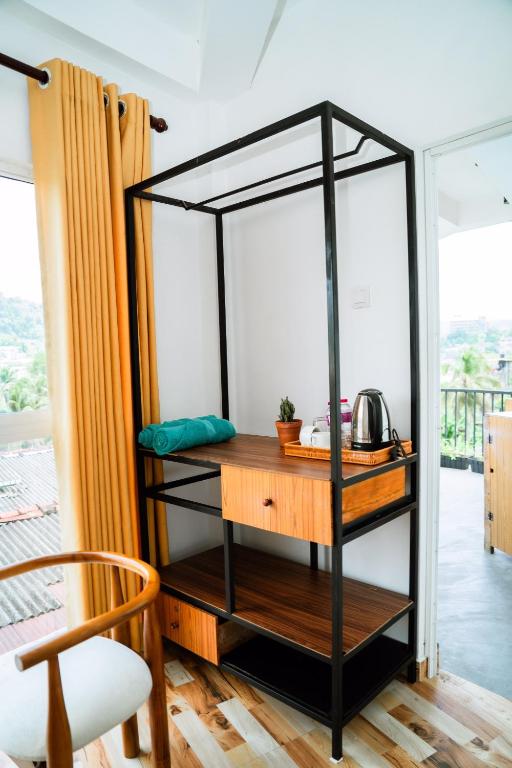Postel nebo postele na pokoji v ubytování The Kandy Home & City mirror Hostel