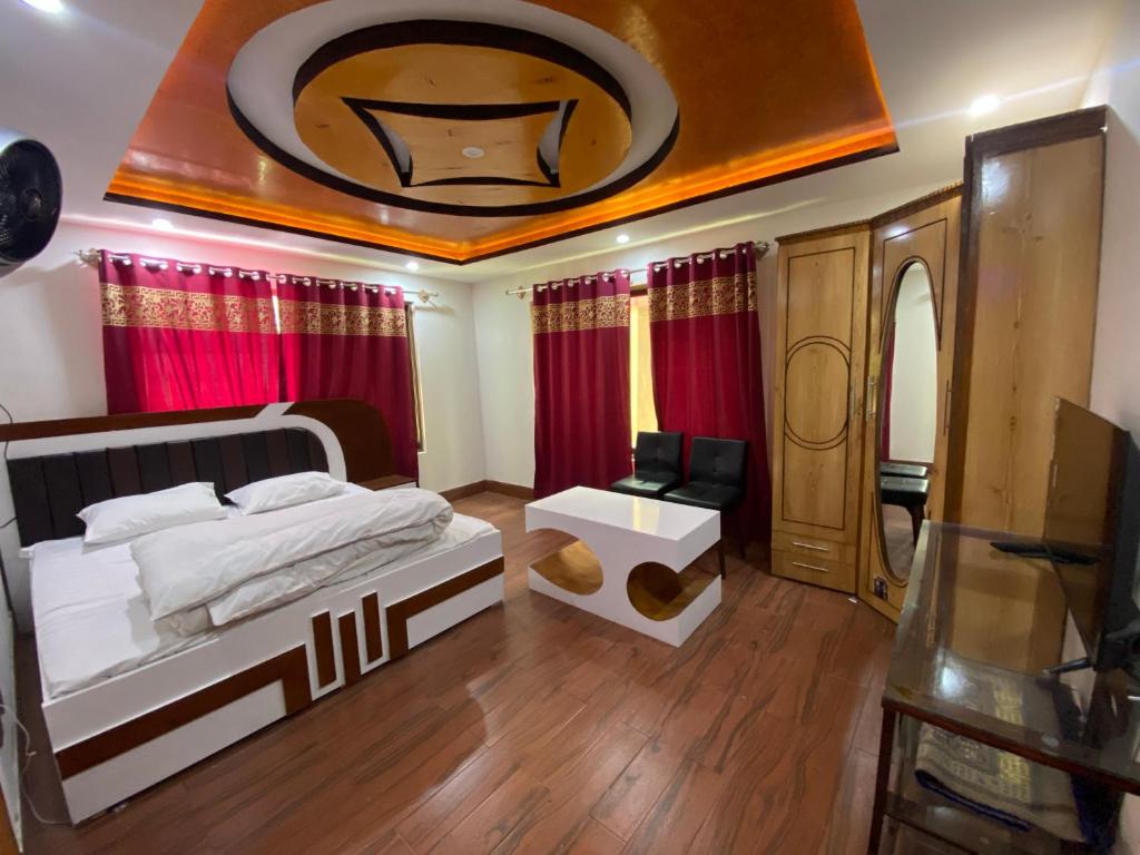 Postel nebo postele na pokoji v ubytování Moonlight guesthouse gamba skardu