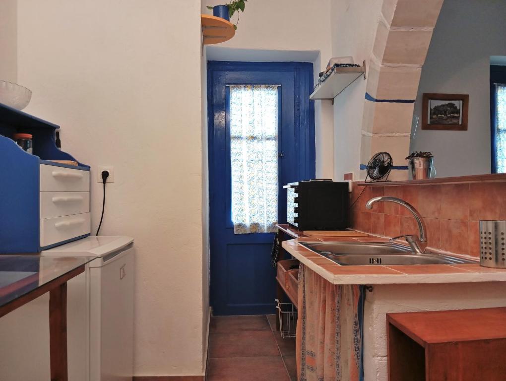 Kuchyň nebo kuchyňský kout v ubytování Le Gîte
