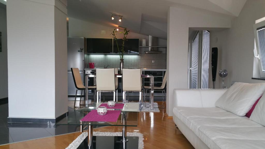Posezení v ubytování Comfort Deluxe Kosmos Apartments