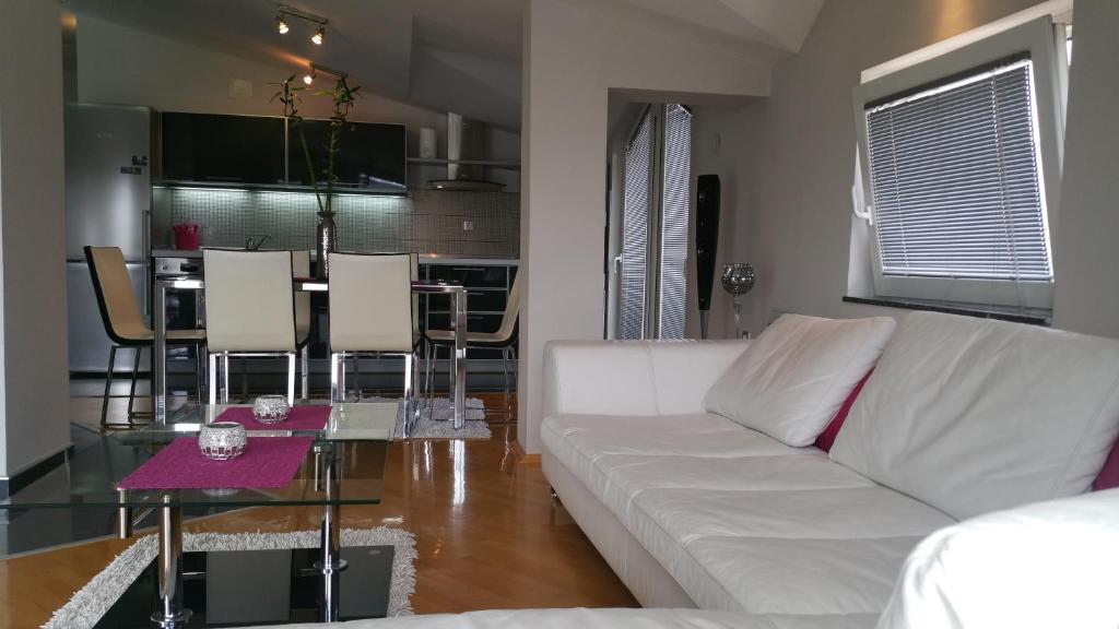 Posezení v ubytování Comfort Deluxe Kosmos Apartments
