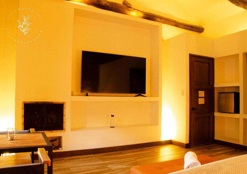 TV a/nebo společenská místnost v ubytování Hotel Casa Manoa Sesquile