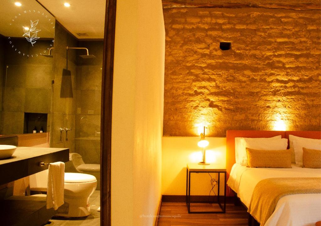 Postel nebo postele na pokoji v ubytování Hotel Casa Manoa Sesquile