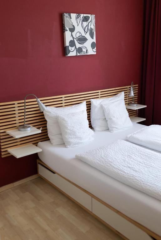 Postel nebo postele na pokoji v ubytování HOTEL MARIA