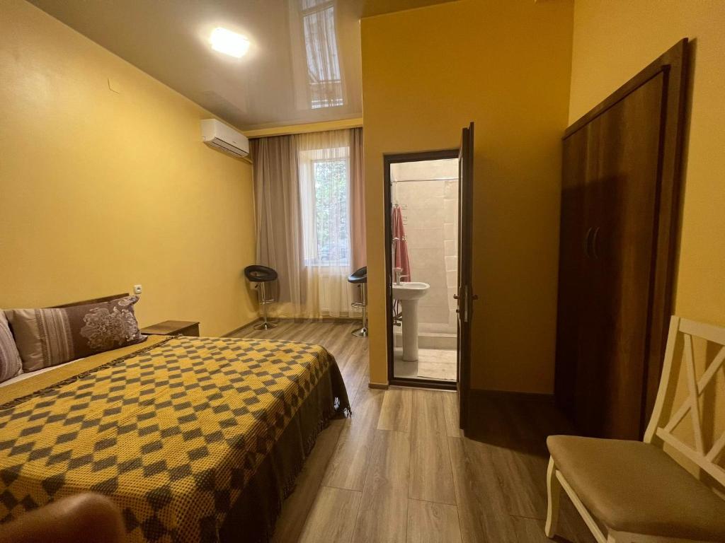 Postel nebo postele na pokoji v ubytování Kolkha - 1Kolkheti street