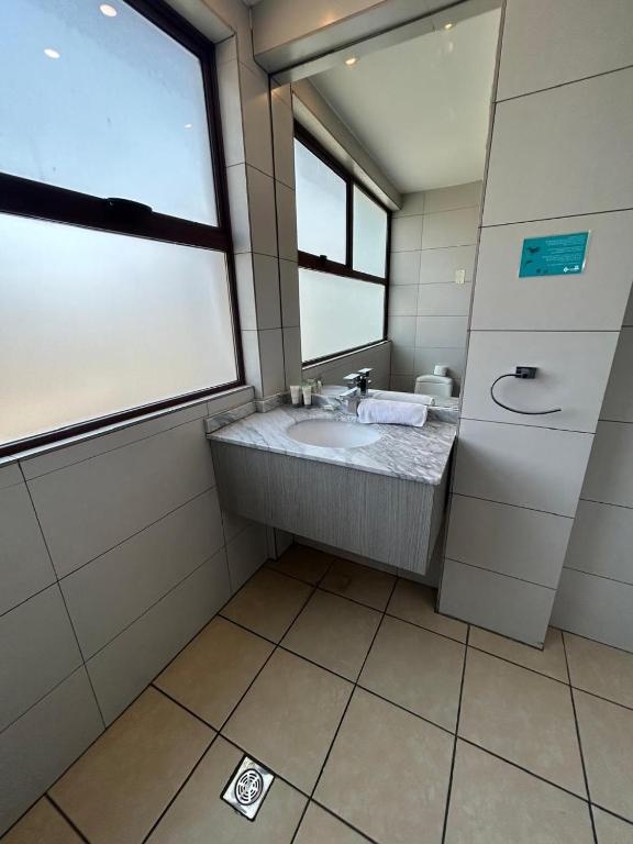 Koupelna v ubytování Hotel Plaza Ñuñoa
