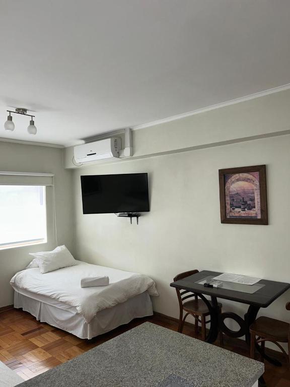 Postel nebo postele na pokoji v ubytování Hotel Plaza Ñuñoa