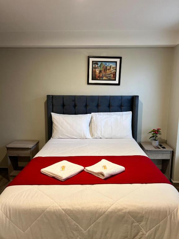 Letto o letti in una camera di HAYLLI QOSQO Hotel Inn