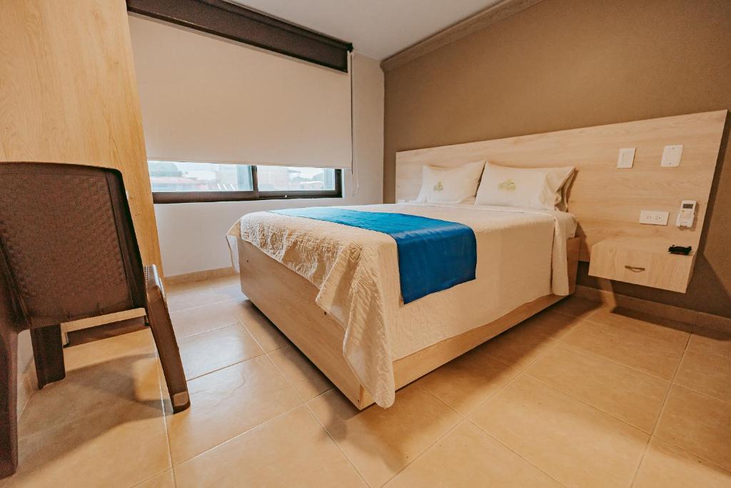 Postel nebo postele na pokoji v ubytování HOTEL VERANO