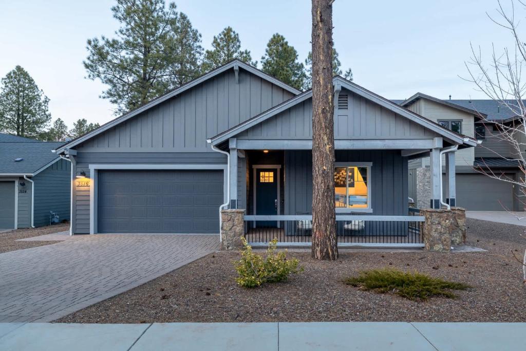 a house with a garage at Flagstaff Route 66 Retreat in Flagstaff