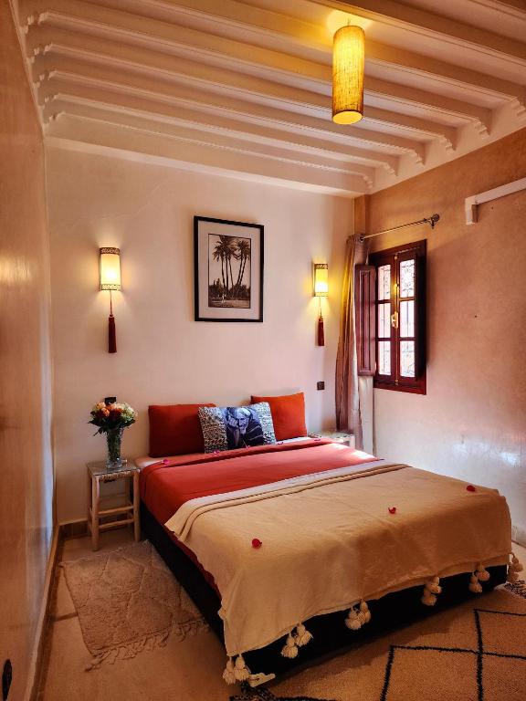 Postel nebo postele na pokoji v ubytování Riad Mumtaz Marrakech