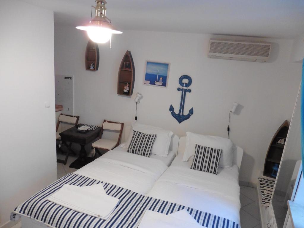 Posteľ alebo postele v izbe v ubytovaní Room Leon