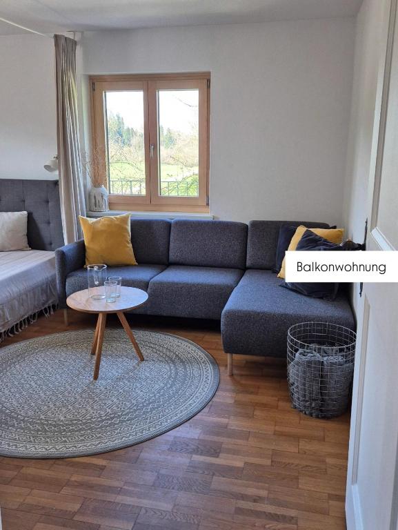 A seating area at Ferienwohnung Tostner Burgblick