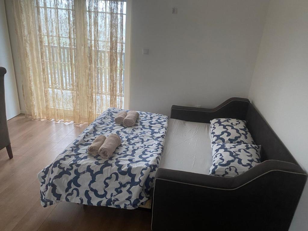 Postel nebo postele na pokoji v ubytování Apartmani Amon