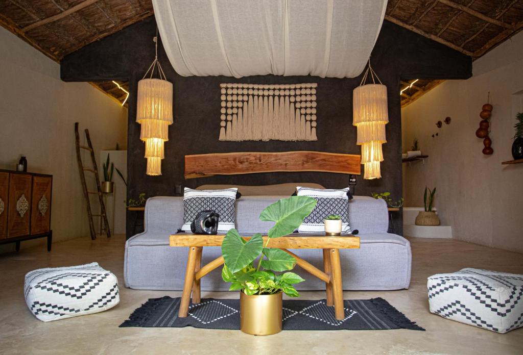 Posezení v ubytování The Yellow Nest Tulum