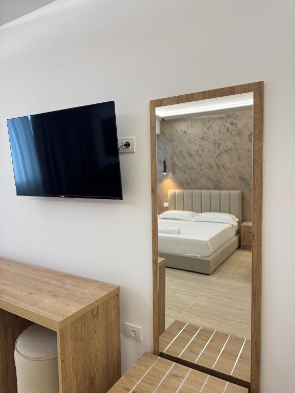 Postel nebo postele na pokoji v ubytování Moonlight Hotel