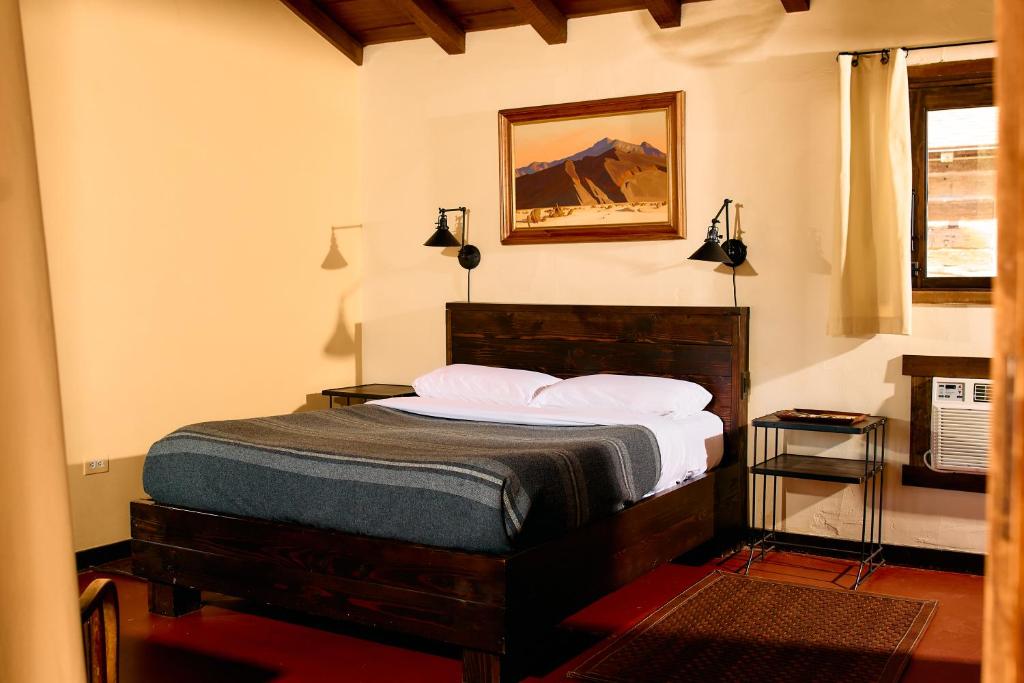 Postel nebo postele na pokoji v ubytování Pioneertown Motel