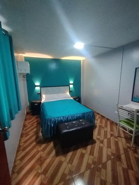Postel nebo postele na pokoji v ubytování Hostal El Pilar