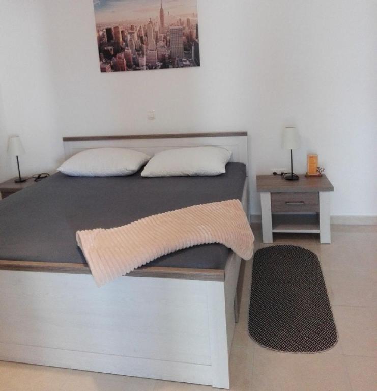 Posteľ alebo postele v izbe v ubytovaní Apartments Markas