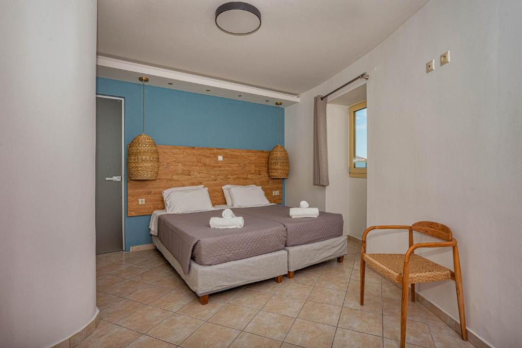 Postel nebo postele na pokoji v ubytování Island Kavos