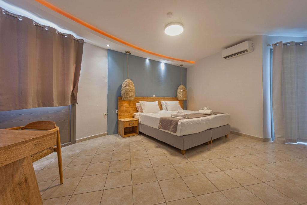 Postel nebo postele na pokoji v ubytování Island Kavos
