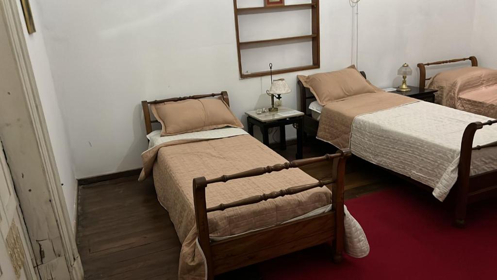Postel nebo postele na pokoji v ubytování Casa rosa 4