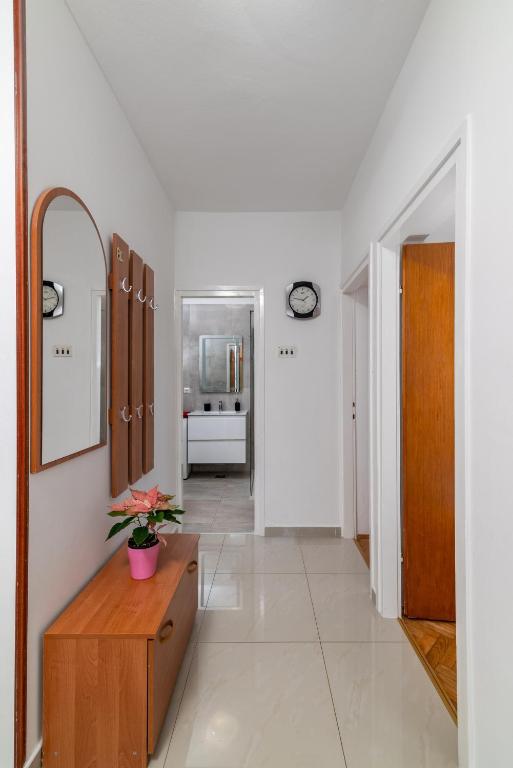 Łóżko lub łóżka w pokoju w obiekcie Apartments with parking spaces Rabac, Labin - 7622