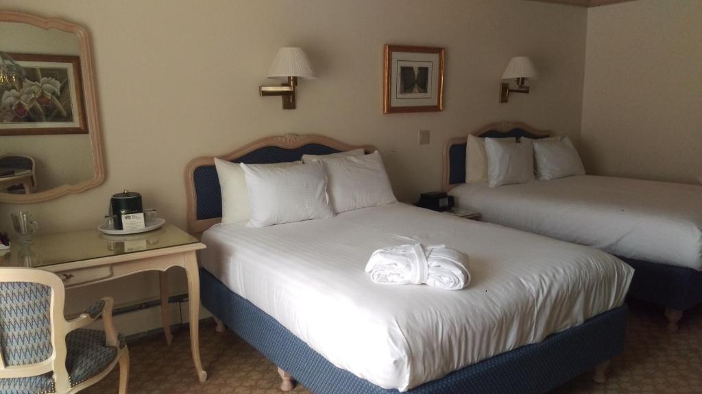 Postel nebo postele na pokoji v ubytování Hotel Gasthof Gramshammer
