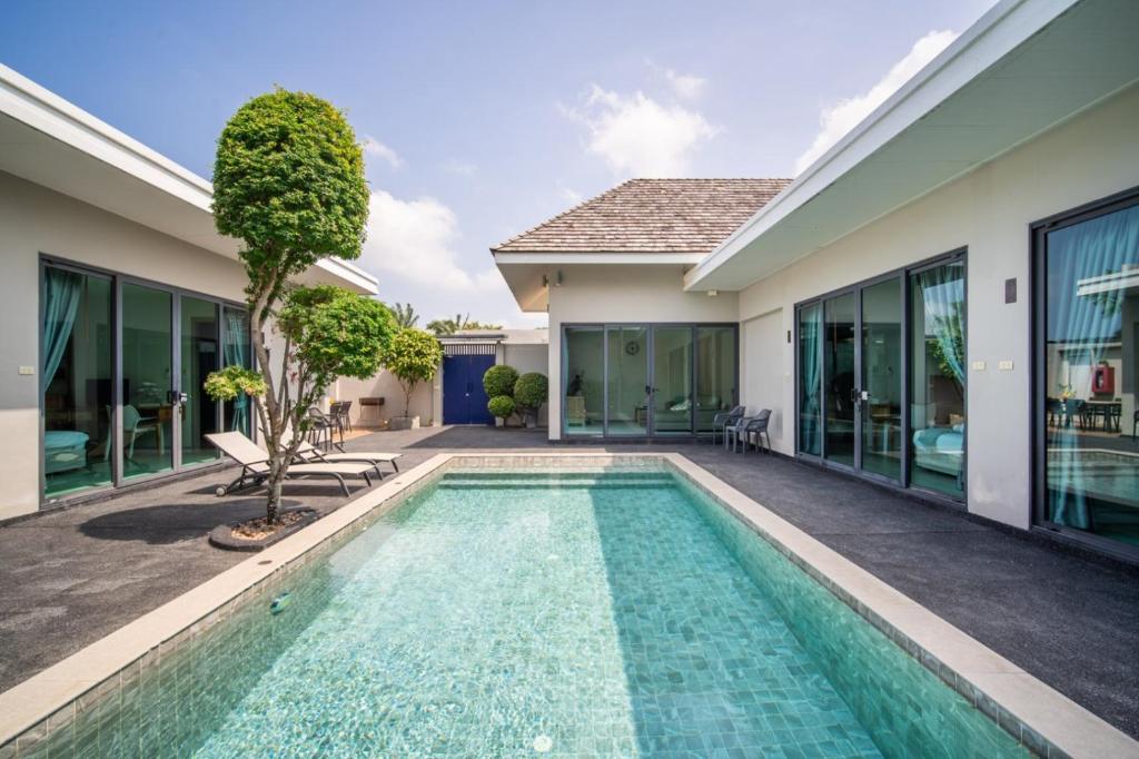 Πισίνα στο ή κοντά στο Tropical 4 Bedroom Pool Villa