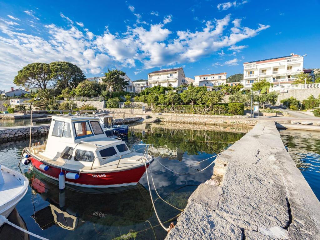 Apartment Rab with Private Dock and Sea Views