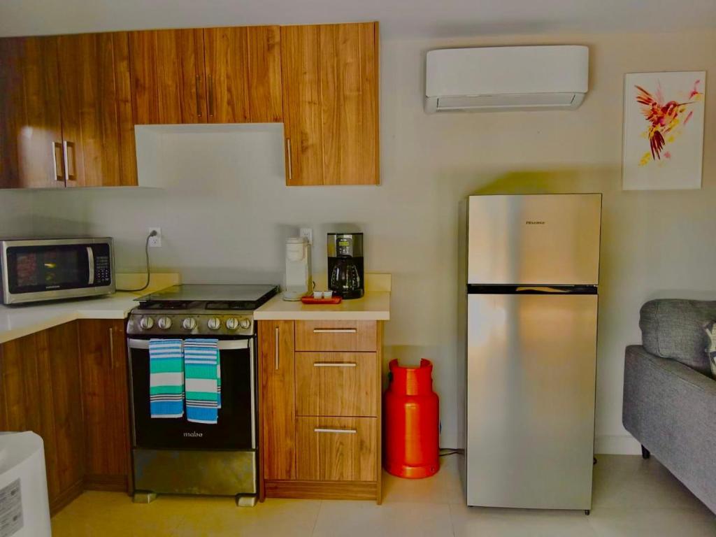 Kuchyň nebo kuchyňský kout v ubytování Casa Zun Zun Roatan
