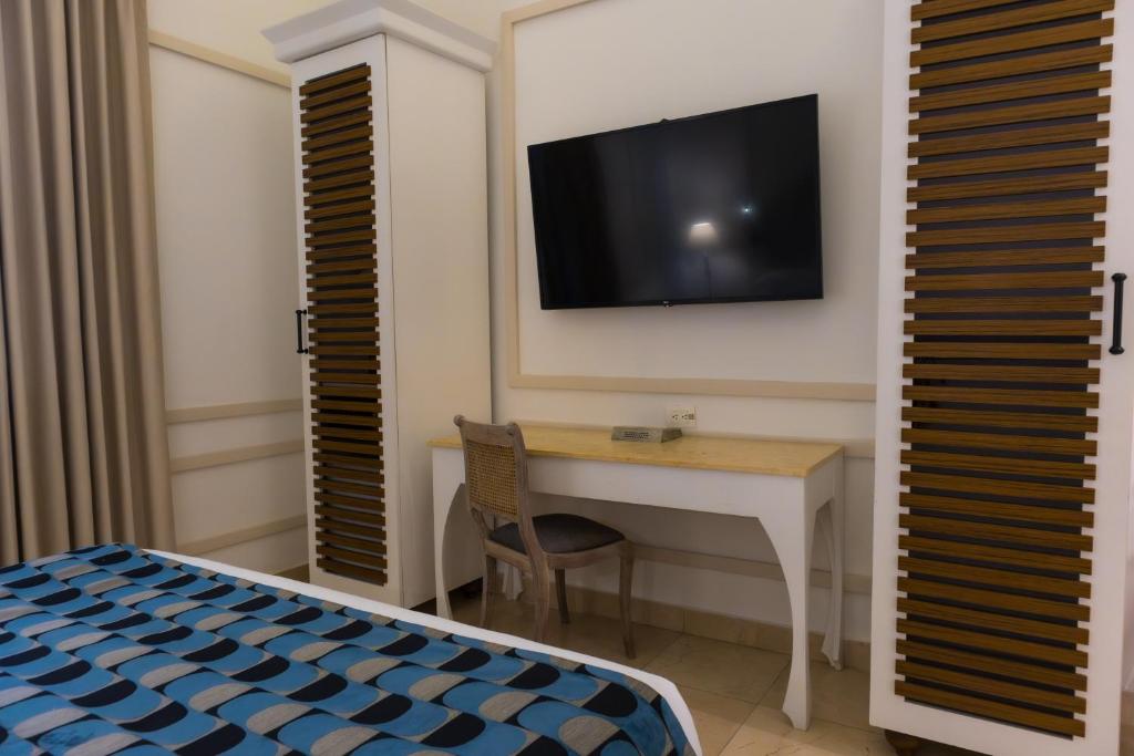 TV a/nebo společenská místnost v ubytování Hotel Caribe by Faranda Grand, a member of Radisson Individuals
