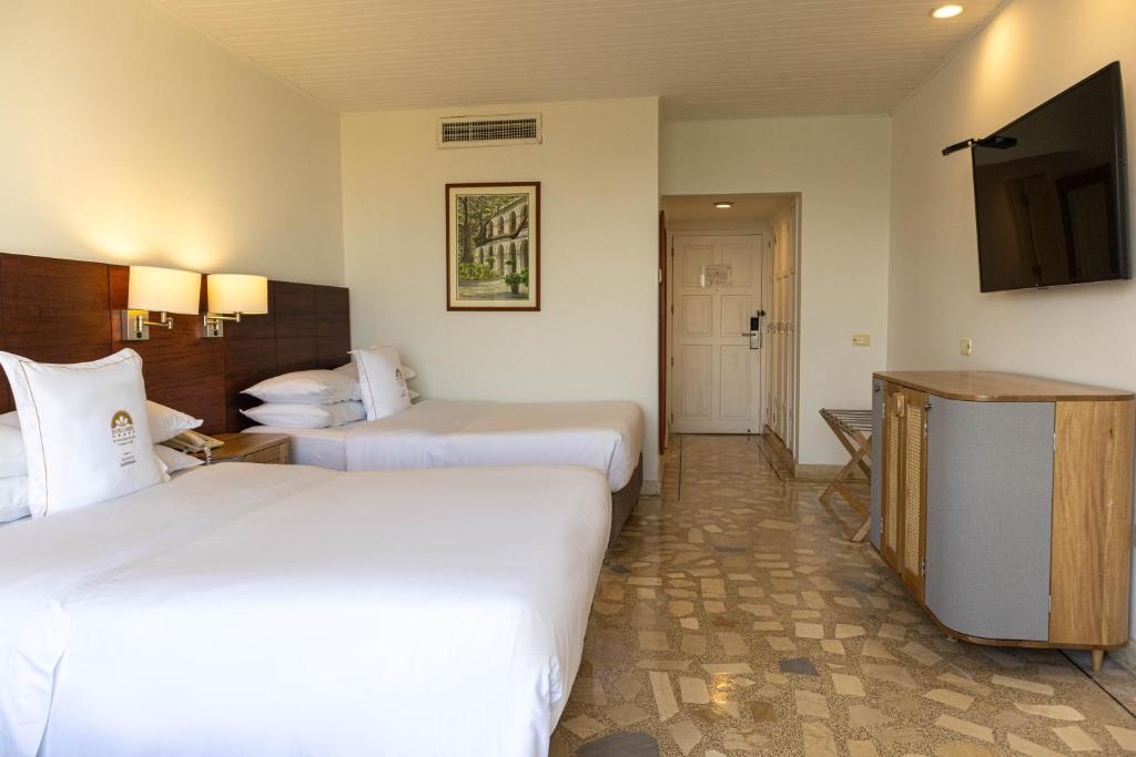 Postel nebo postele na pokoji v ubytování Hotel Caribe by Faranda Grand, a member of Radisson Individuals