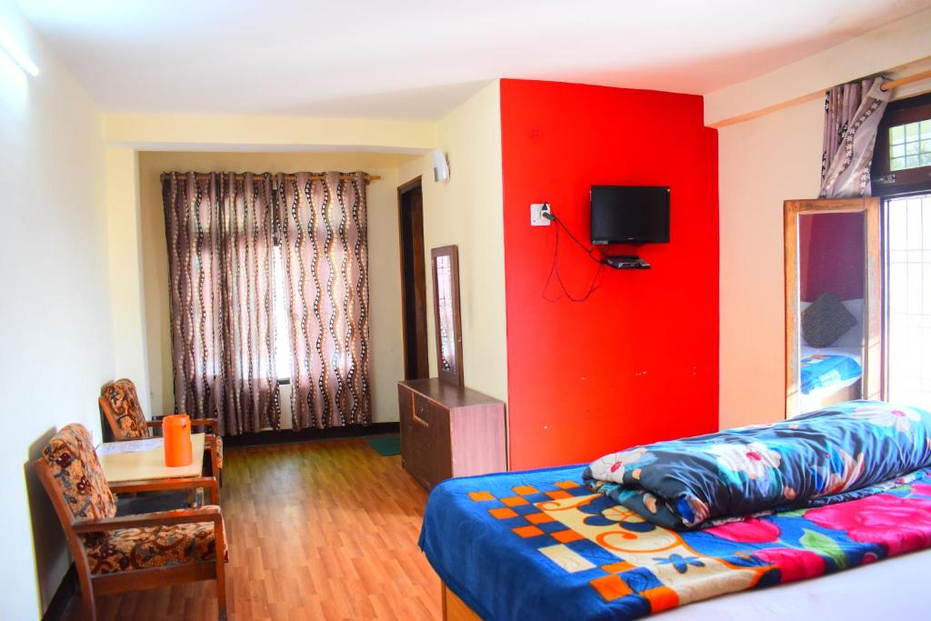 Postel nebo postele na pokoji v ubytování NAiNi VIEW RESORT
