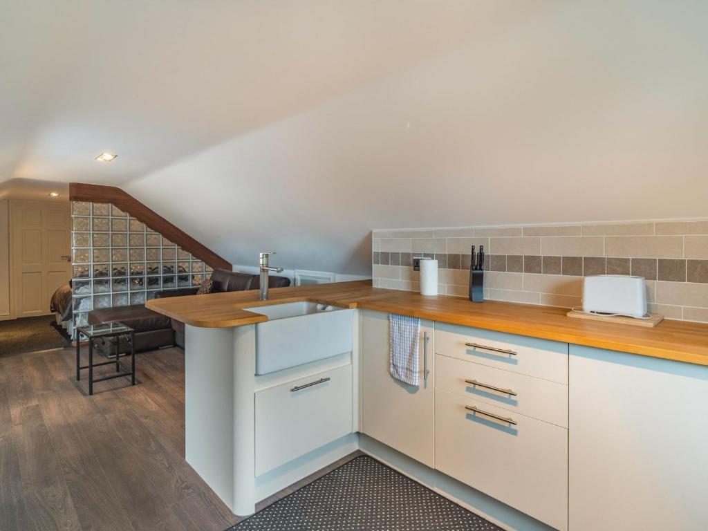 Kuchyň nebo kuchyňský kout v ubytování Highfield Cottage