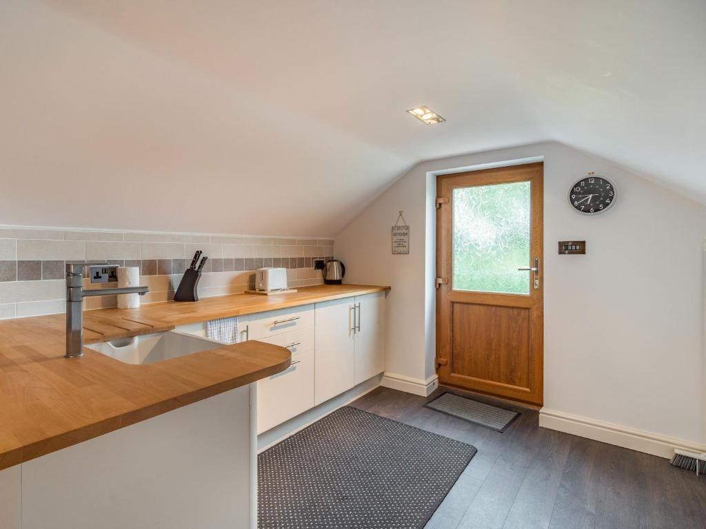 Kuchyň nebo kuchyňský kout v ubytování Highfield Cottage