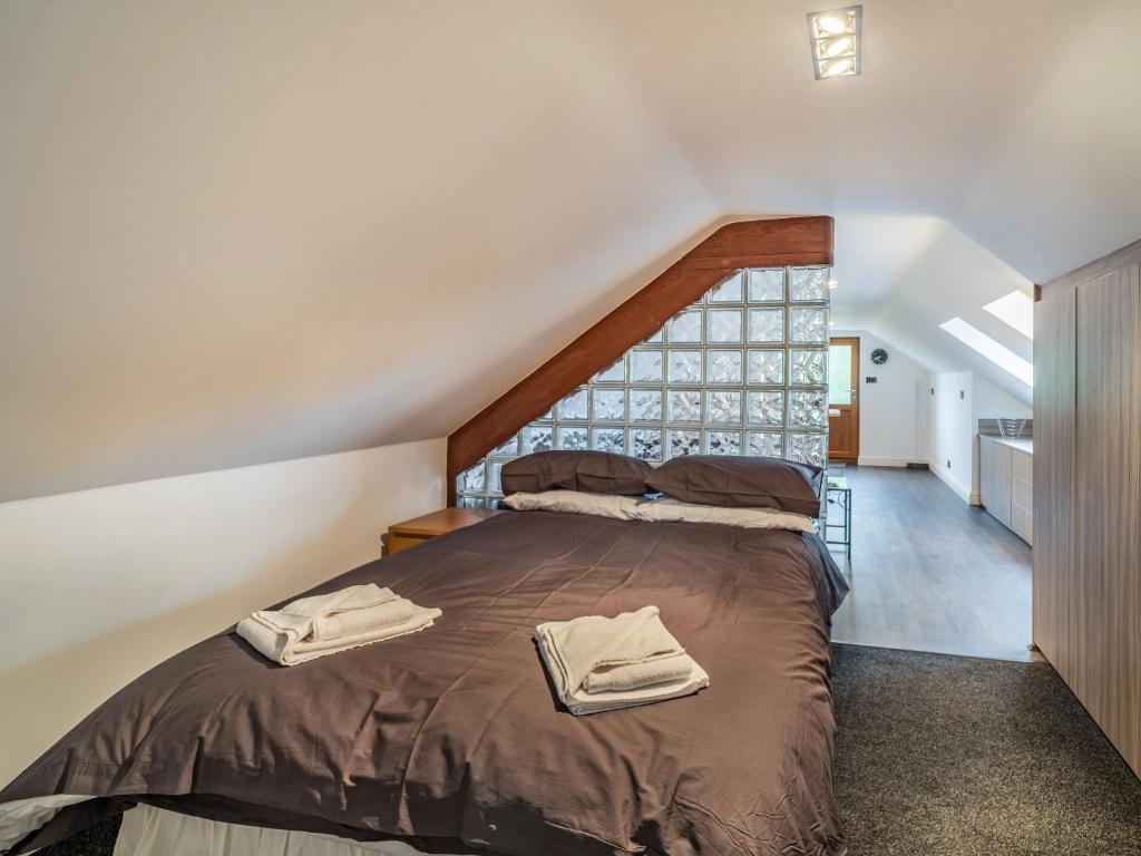 Postel nebo postele na pokoji v ubytování Highfield Cottage