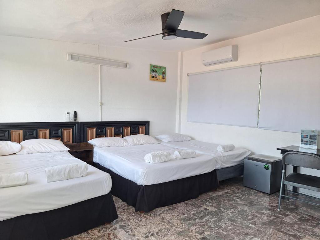 Letto o letti in una camera di Casa Breizh