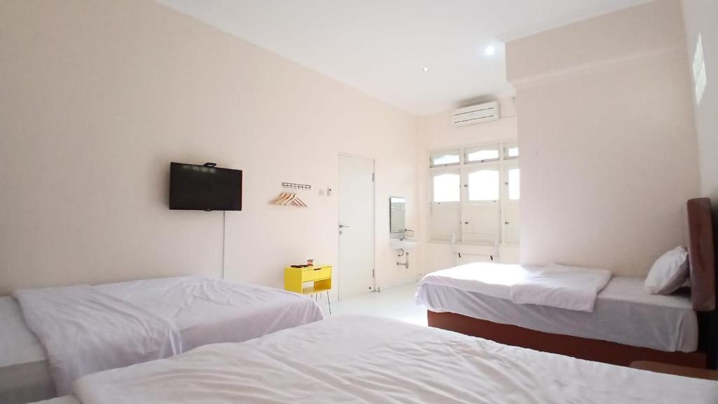 Kenewae Living Near Alun-alun Wonosari Mitra RedDoorz - Chambre Familiale