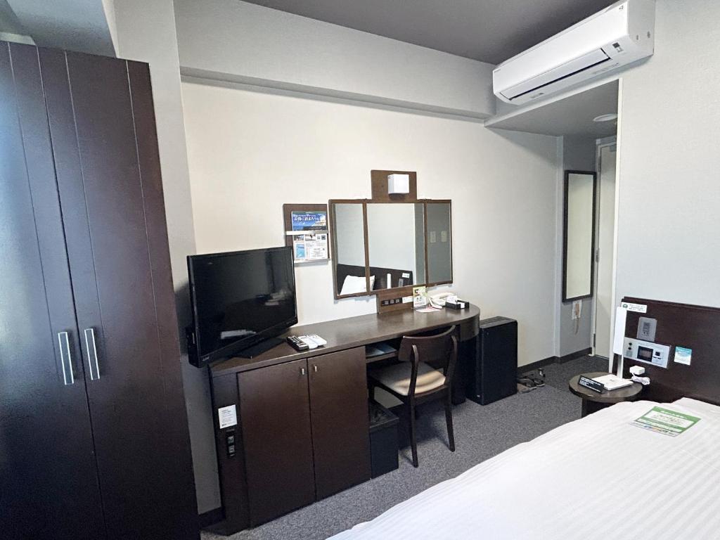 TV a/nebo společenská místnost v ubytování Hotel Route-Inn Iwata Inter