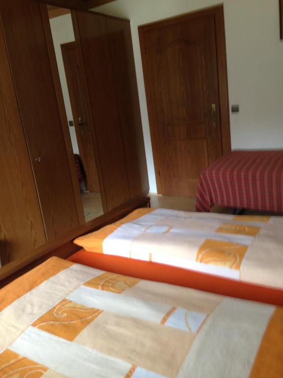 Postel nebo postele na pokoji v ubytování Haus Berchtold