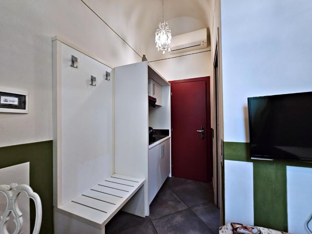 Televízia a/alebo spoločenská miestnosť v ubytovaní AB Suite Bohèmien B&B
