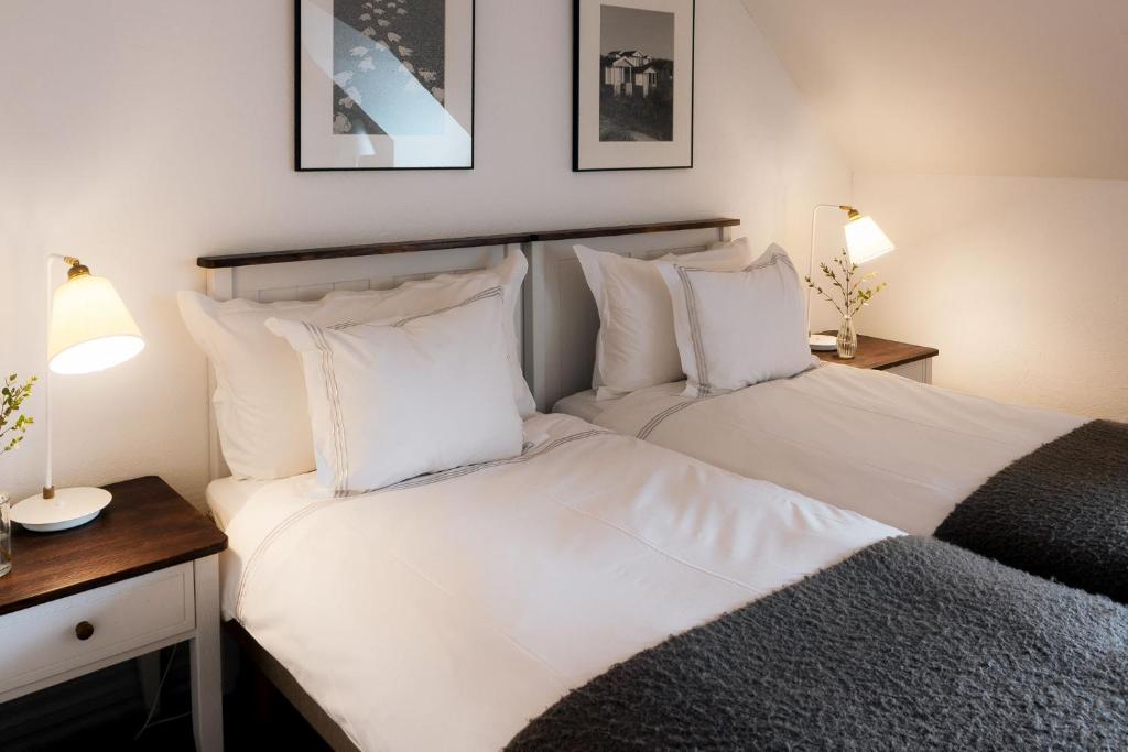 Postel nebo postele na pokoji v ubytování Hotell Gässlingen