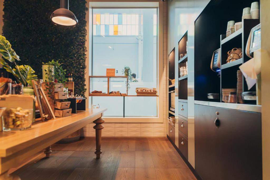 TV a/nebo společenská místnost v ubytování Trafo Hotel Baden